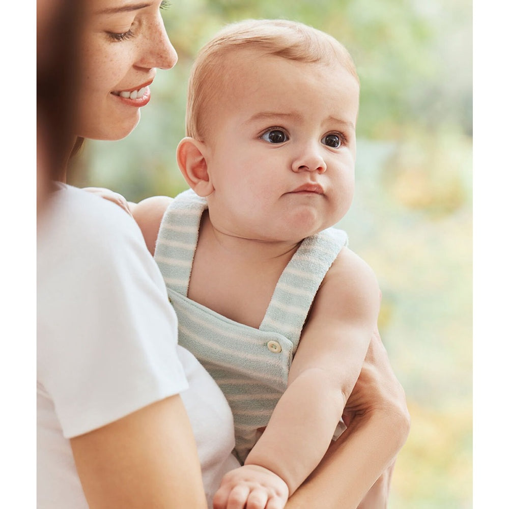 Petit Bateau | Gestreept babyspeelpakje van katoenen badstof