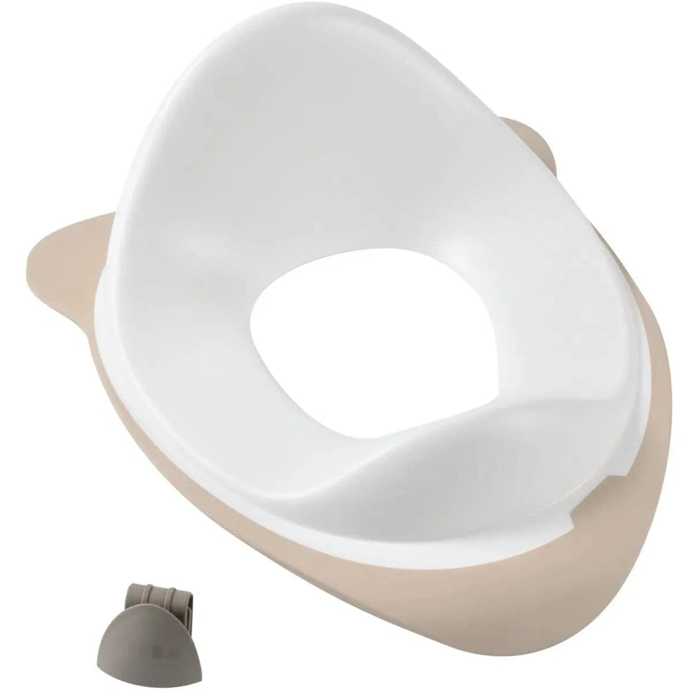 Réducteur de toilettes Béaba stable avec 3 points de fixation - rebord anti-éclaboussures et crochet de suspension inclus